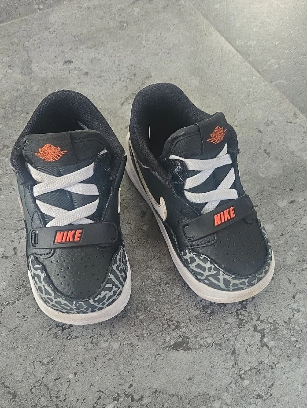 Nike Kids Black Sneakers with White Laces and Orange Logos - Picture 1 of 10